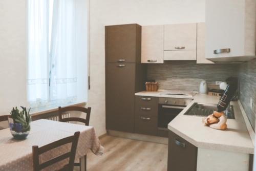 Kuchyň nebo kuchyňský kout v ubytování La Casa di Piccolì di Gabriele Martelli e Catia Pacetti - Camera FARFALLA