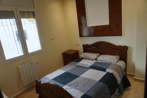 Un pat sau paturi într-o cameră la SamIfrane1