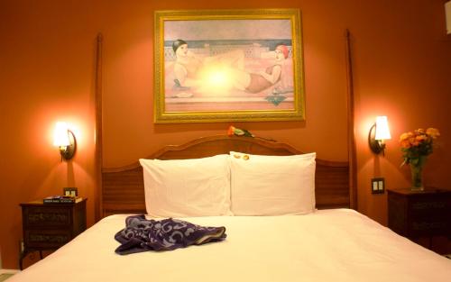 Ένα ή περισσότερα κρεβάτια σε δωμάτιο στο Carisbrooke Inn Bed & Breakfast