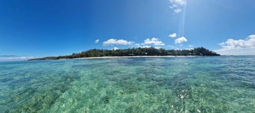 an island in the middle of a large body of water at Voyager Retreat Homestay in Nanuya Lailai