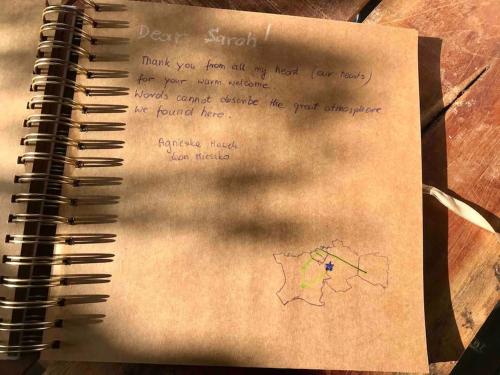 a notebook with a drawing of a map on it at Light flow stylish attic house. m. balcony in Rastatt