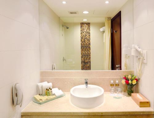 Ett badrum på Casa Real Hotel