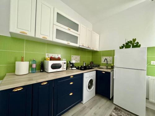 Кухня или кухненски бокс в Ely`s Place