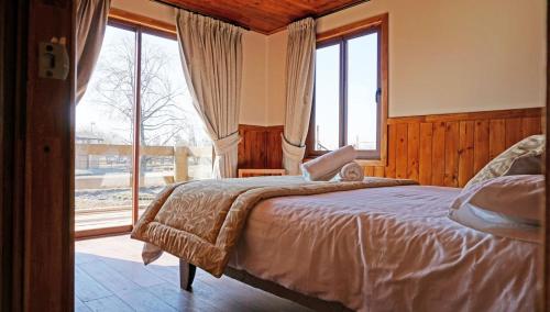 Кровать или кровати в номере Safari Lodge