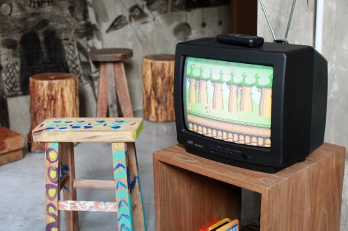 A television and/or entertainment center at Hop Inn