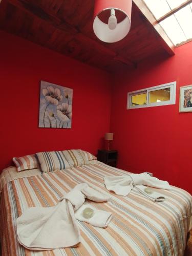 Säng eller sängar i ett rum på Alojamiento Miguel