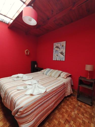 Säng eller sängar i ett rum på Alojamiento Miguel