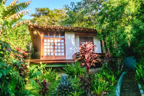 En have udenfor Pousada Jardim das Bromélias