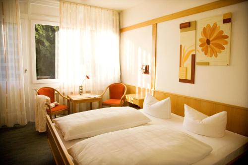 Postel nebo postele na pokoji v ubytování Hotel Gasthof Wasserschloß
