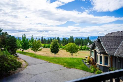 a view of a house from a balcony at Crawford View in Kelowna