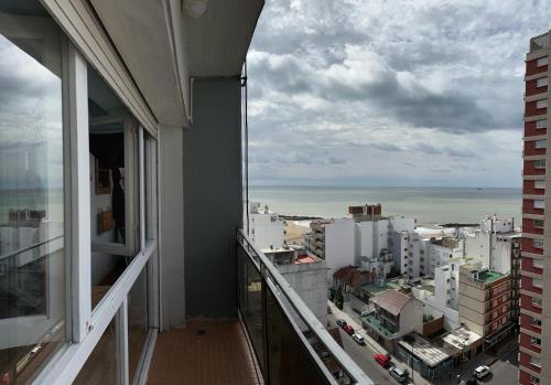 a view of the ocean from a balcony of a building at Hermoso monoambiente con vista al mar en La Perla , Mar del Plata in Mar del Plata