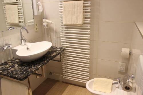 Kúpeľňa v ubytovaní Seehotel Paulitsch