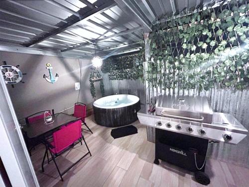 a large bathroom with a tub and a sink and a tub at Casa Doña Guilla 2 