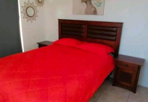 Katil atau katil-katil dalam bilik di LUNA La Serena, se arriendan habitaciones tipo hostal
