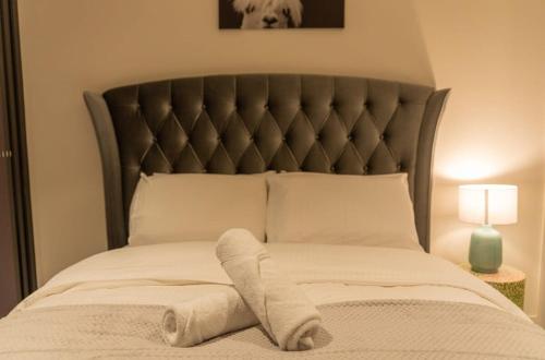 Posteľ alebo postele v izbe v ubytovaní Pure Luxury Modern Apt Heart of CBD Car Park