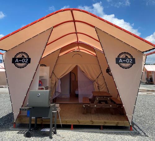 a large tent with a table inside of it at Yeongcheon Auno feliz in Yeongcheon