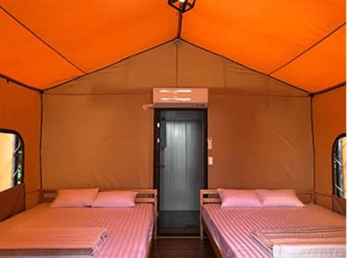Katil atau katil-katil dalam bilik di Damyang Raon Glamping