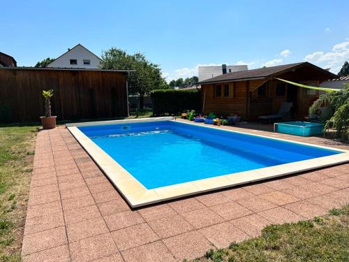 Bazén v ubytování Ferienwohnungen zur Elz - Traumhafte 160 qm Wohnung mit Pool und Garten Nähe des Europaparks nebo v jeho okolí