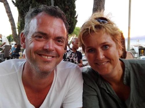 a man and a woman posing for a picture at Holiday home LEUK Comfortable Vacation Home in Callantsoog