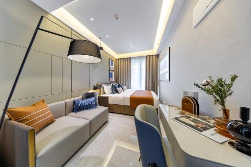 Posezení v ubytování Excellence International Apartment - Convention & Exhibition Center