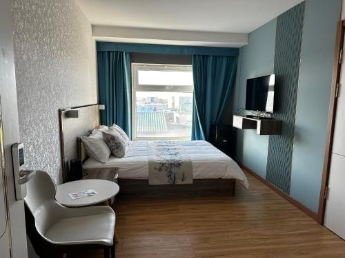 Krevet ili kreveti u jedinici u okviru objekta Khovuun hotel