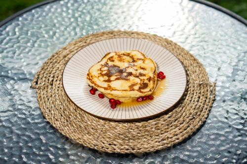 a pastry on a plate on a table at Ritual Ubud in Gianyar