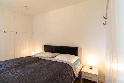 Postel nebo postele na pokoji v ubytování Ferienwohnung Achterdeck