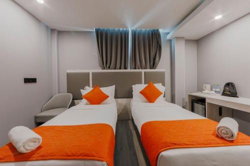 Postel nebo postele na pokoji v ubytování Starry Beach Inn