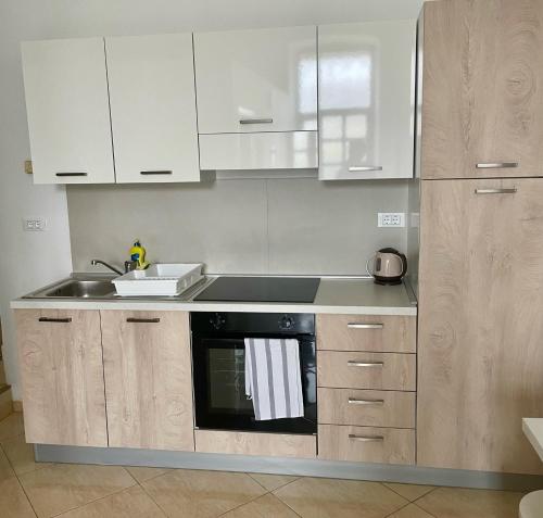 Η κουζίνα ή μικρή κουζίνα στο Spacious Apartment