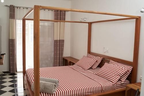 Katil atau katil-katil dalam bilik di JIRAJIRA HOTEL