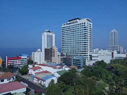 a skyline of a city with tall buildings at Sheraton Colombo Hotel in Colombo