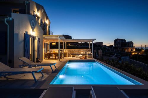La alberca dentro o cerca de Villa Ariste with stunning views near Fiscardo