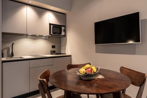 Η κουζίνα ή μικρή κουζίνα στο Amare Suite & Apartments