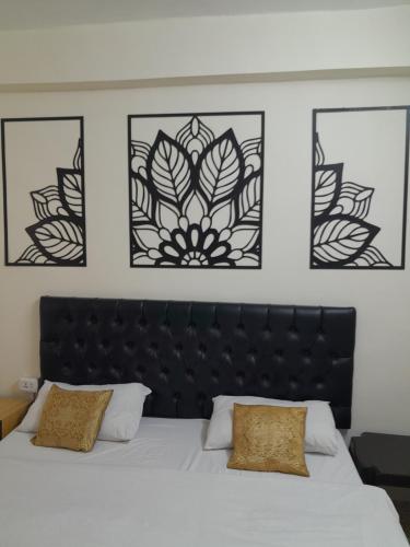 Postel nebo postele na pokoji v ubytování Hamoudah Hotel