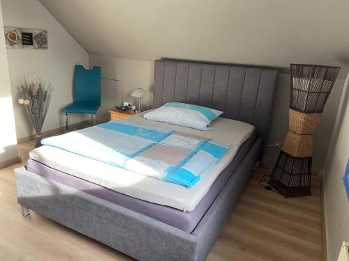 מיטה או מיטות בחדר ב-Ferienwohnung Evelyn und Reinhard Himmler