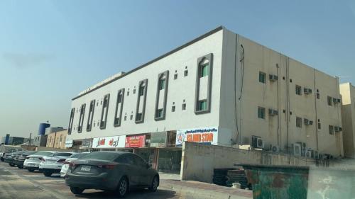 a car parked in front of a building at دانية للأجنحة الفندقية in Al Jubayl