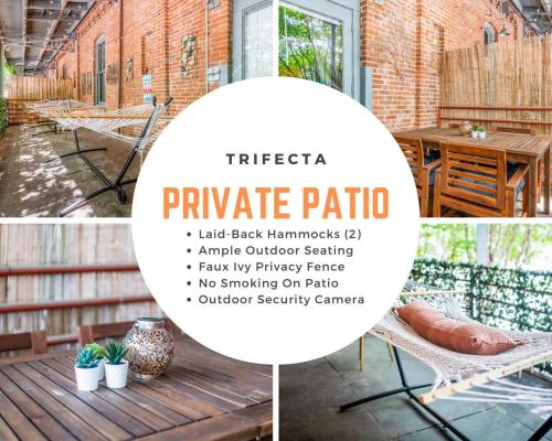 a patio with a picnic porch with a table and chairs at 100 Year-Old Historic Brick 2BR Loft & Large Patio & Hammocks & High Ceiling in Durham