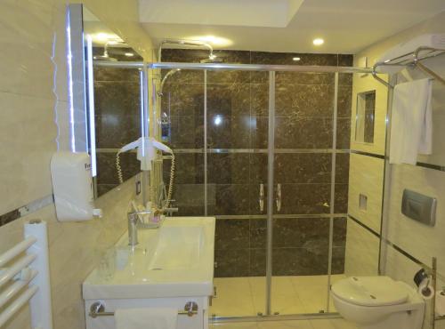 Ванная комната в Tempo Residence Comfort Izmir