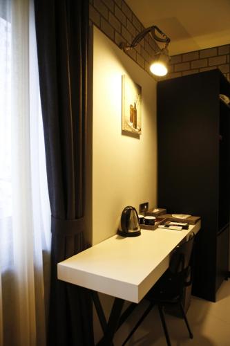 a telephone sitting on a desk in a room at Hotel Doma Myeongdong in Seoul