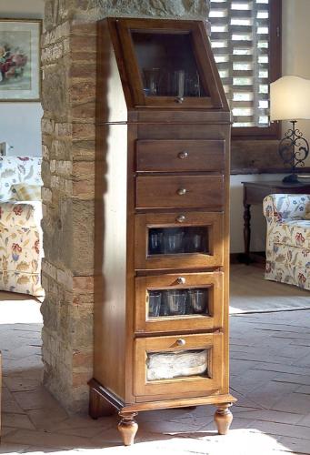 a wooden dresser with four drawers in a room at Tenuta il Cerro in Vicchio