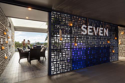 a dining room with a sign on the wall at Anantara Vacation Club Mai Khao Phuket in Mai Khao Beach