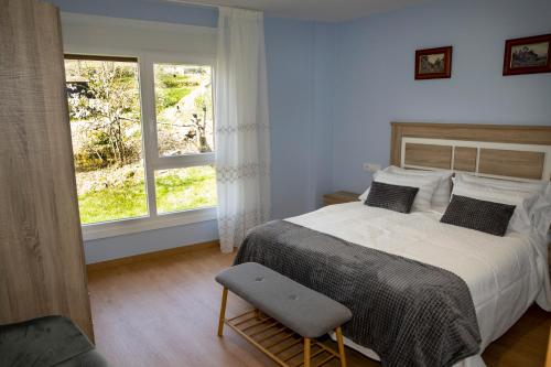 Ένα ή περισσότερα κρεβάτια σε δωμάτιο στο Casa Saborido