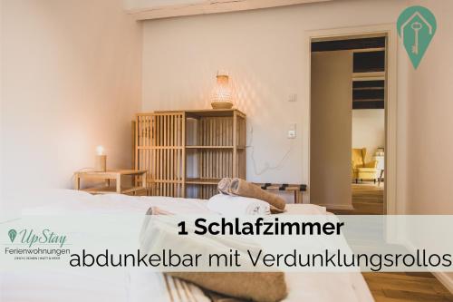 Postel nebo postele na pokoji v ubytování Anna14 - Gulfhof Boomgaarden