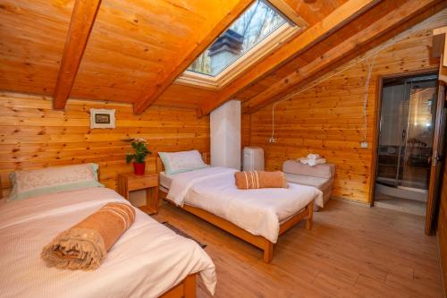 Ένα ή περισσότερα κρεβάτια σε δωμάτιο στο Bee Eco Guest House