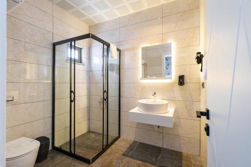 Koupelna v ubytování Hipodrom Hotel