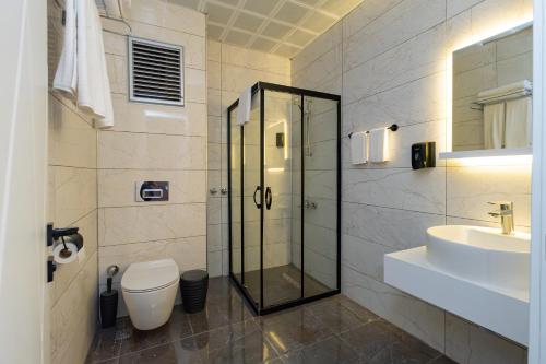 Koupelna v ubytování Hipodrom Hotel