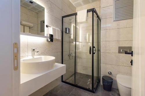 Koupelna v ubytování Hipodrom Hotel