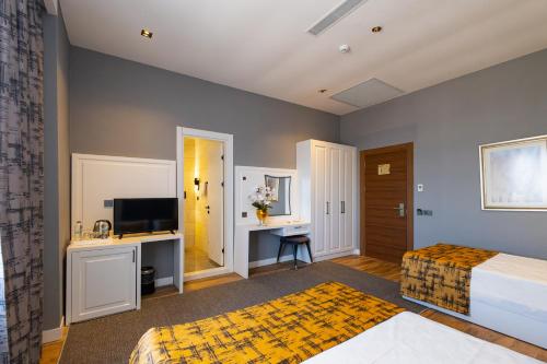 Kuchyň nebo kuchyňský kout v ubytování Hipodrom Hotel