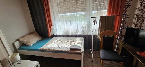 Postel nebo postele na pokoji v ubytování Gasthaus Elbe