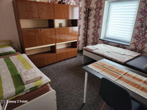 Postel nebo postele na pokoji v ubytování Gasthaus Elbe